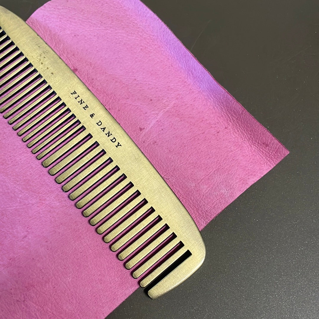 Fine and dandy brass comb