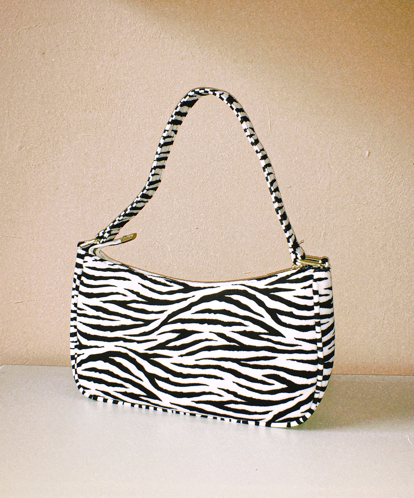 The Zebra Baguette Bag by Veronique