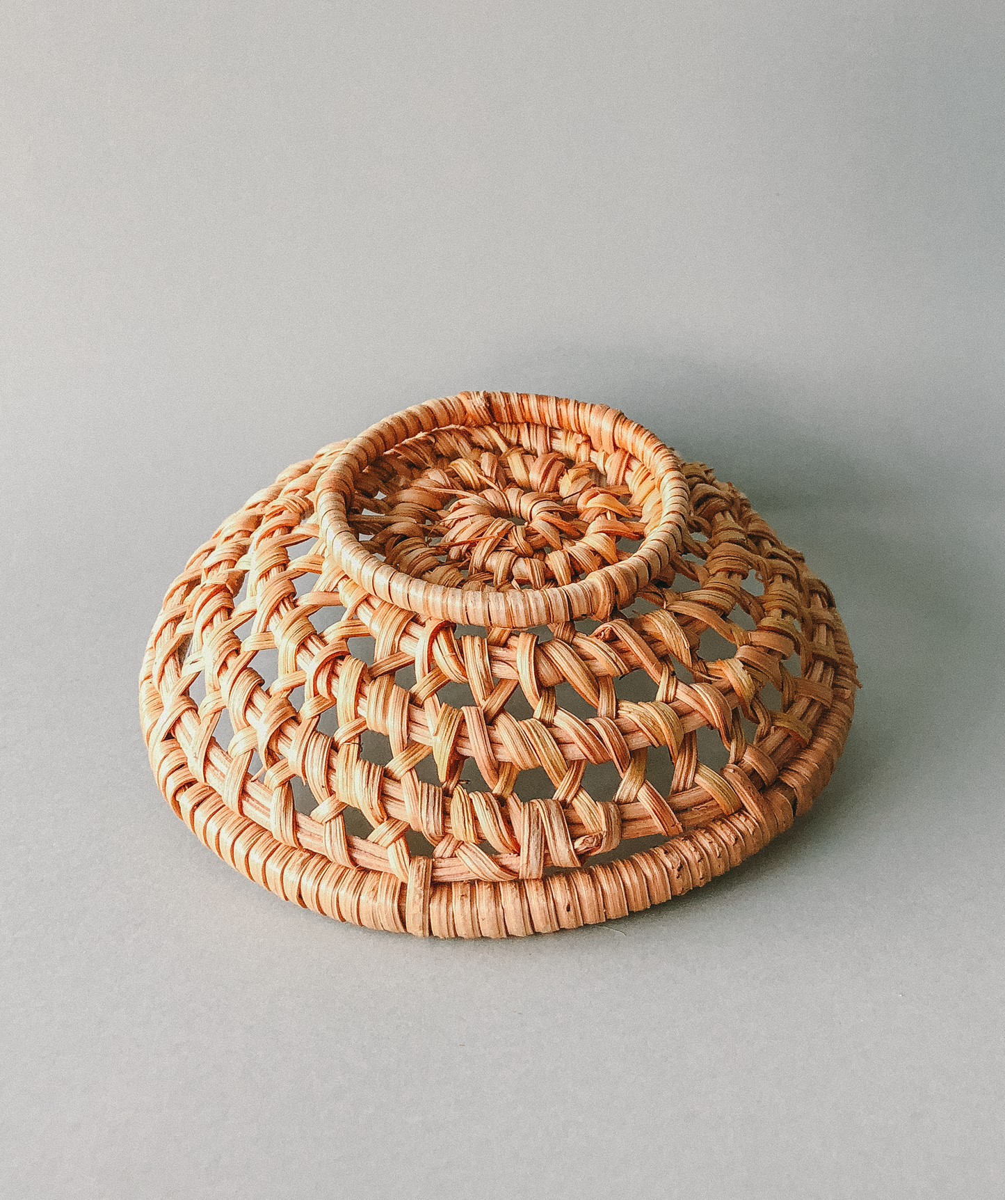 Handwoven Rattan Basket Coasters  by PROSE Tabletop